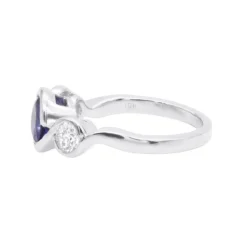 Unique Round Cut Tanzanite And Diamond Engagement Ring 18K White Gold -Outlet Radiant Bijou Store channel set round cut tanzanite and diamond engagement ring 18k gold backwh